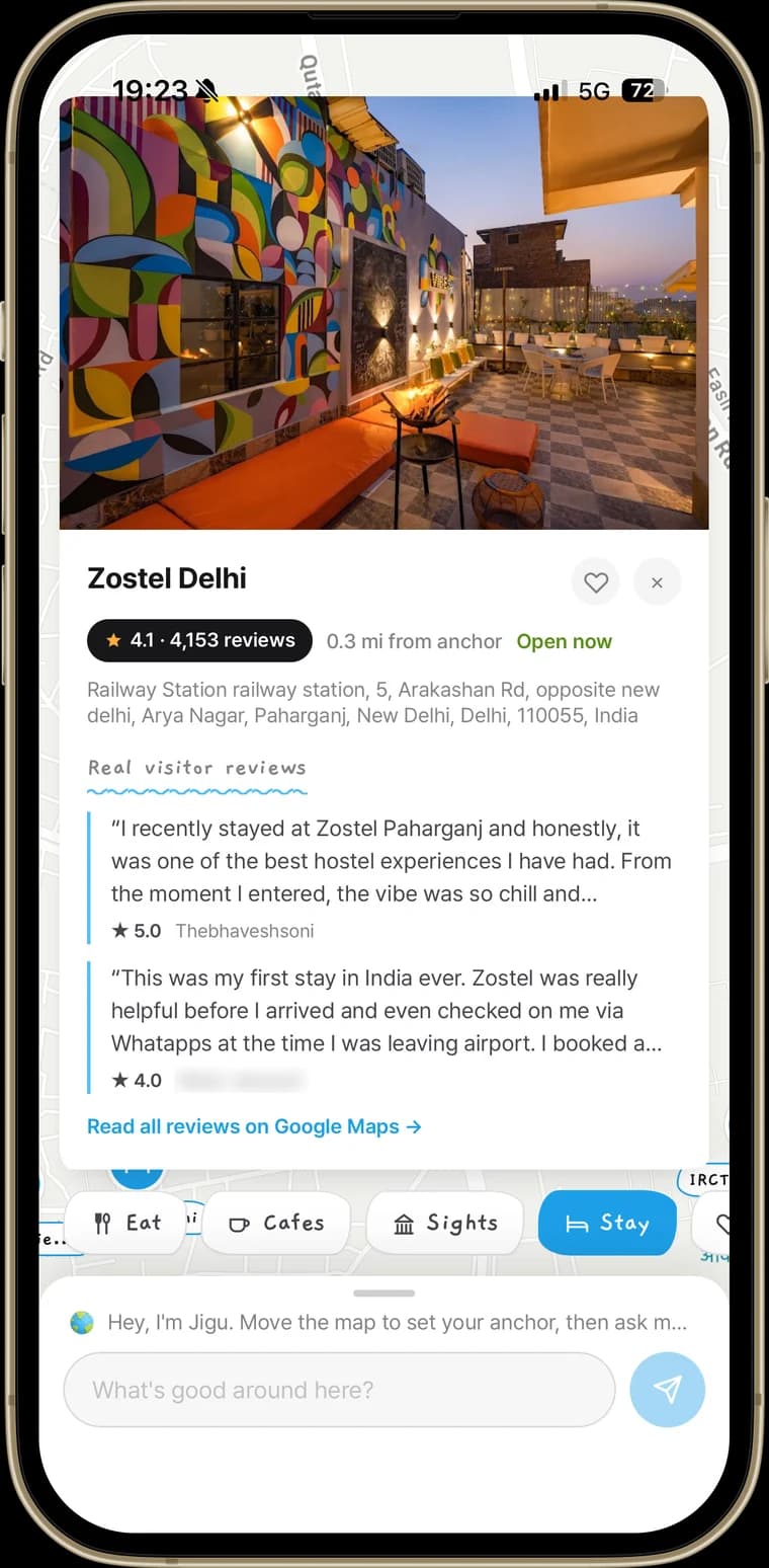 A JIGU place page showing a photo, rating, distance from the anchor, and quoted visitor reviews.